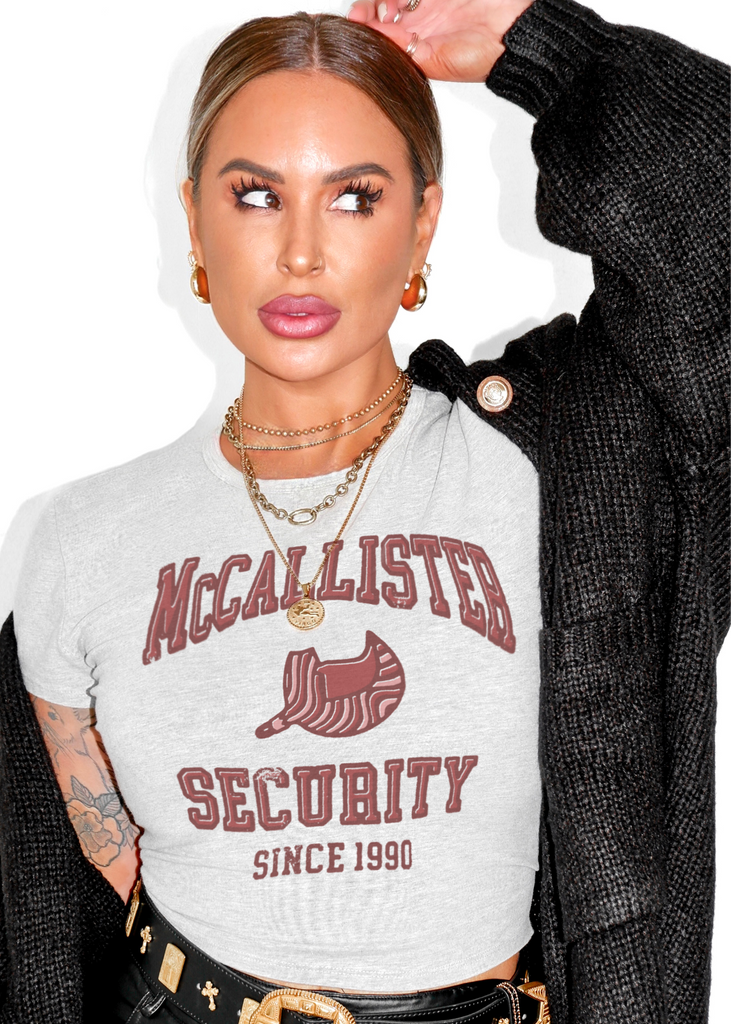 pebby forevee Short Sleeve Top MCCALLISTER SECURITY GRAPHIC BABY TEE