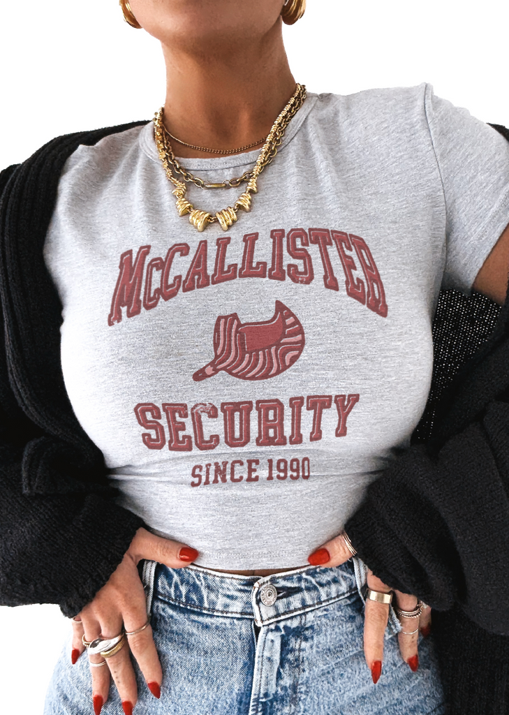 pebby forevee Short Sleeve Top MCCALLISTER SECURITY GRAPHIC BABY TEE