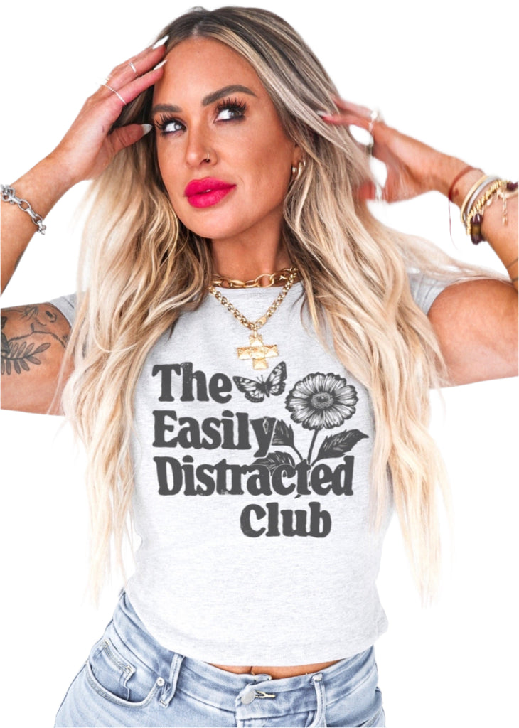 pebby forevee Short Sleeve Top THE EASILY DISTRACTED CLUB GRAPHIC BABY TEE